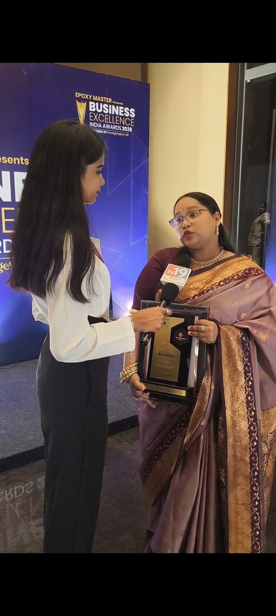 Recipient receiving an award on stage