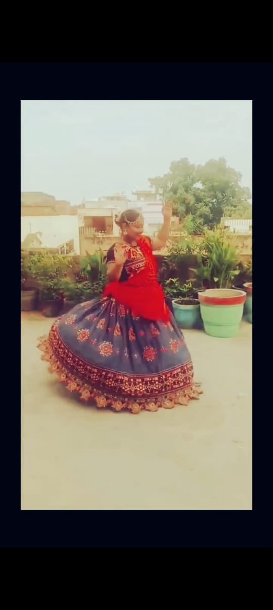 Outdoor dance performance in a colorful costume