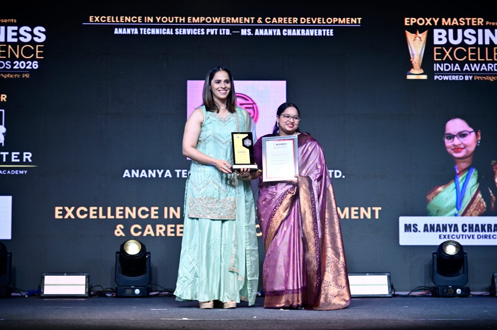 Award presentation with participants on stage